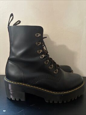 Dr. Martens Leona platform boots featuring a black smooth leather size 9
